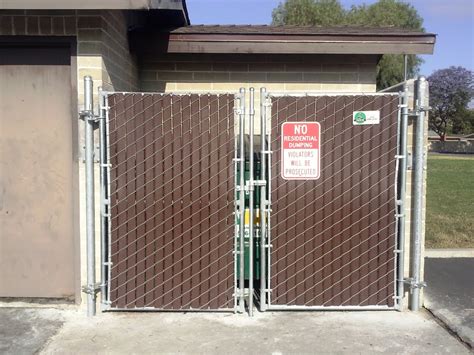 trash enclosure metal frame cover|trash enclosure with swingable gate.